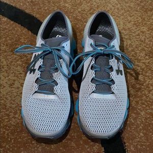 Under Armour speedform charged.  Grey and teal.